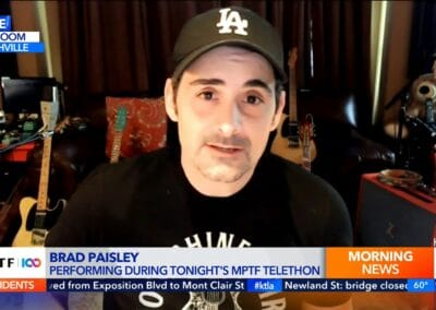 Brad Paisley talks giving back and his performance for ‘Lights, Camera, Take Action’ telethon KTLA.mp4_snapshot_05.22.389 A man in a hat is on a television screen.